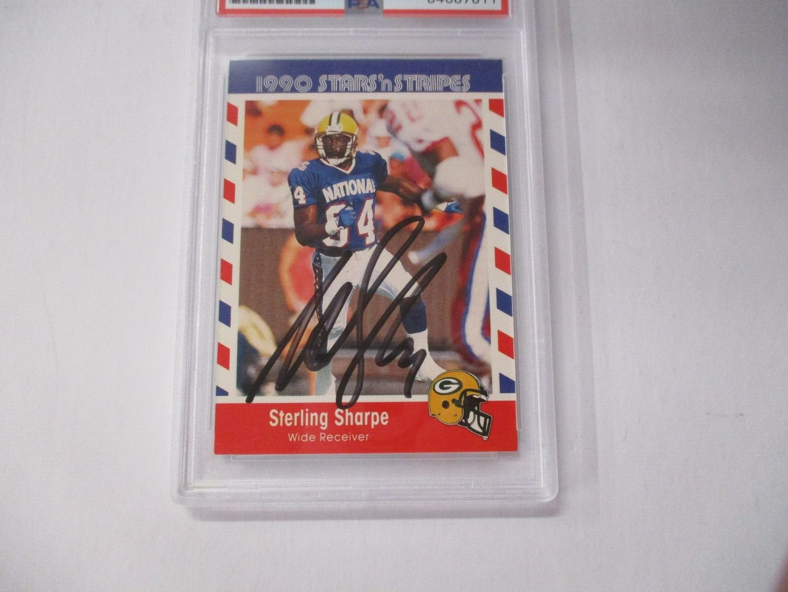 Sterling Sharpe NFL Autographed 1990 Stars N Stripes Topps Card #74 PSA Slab