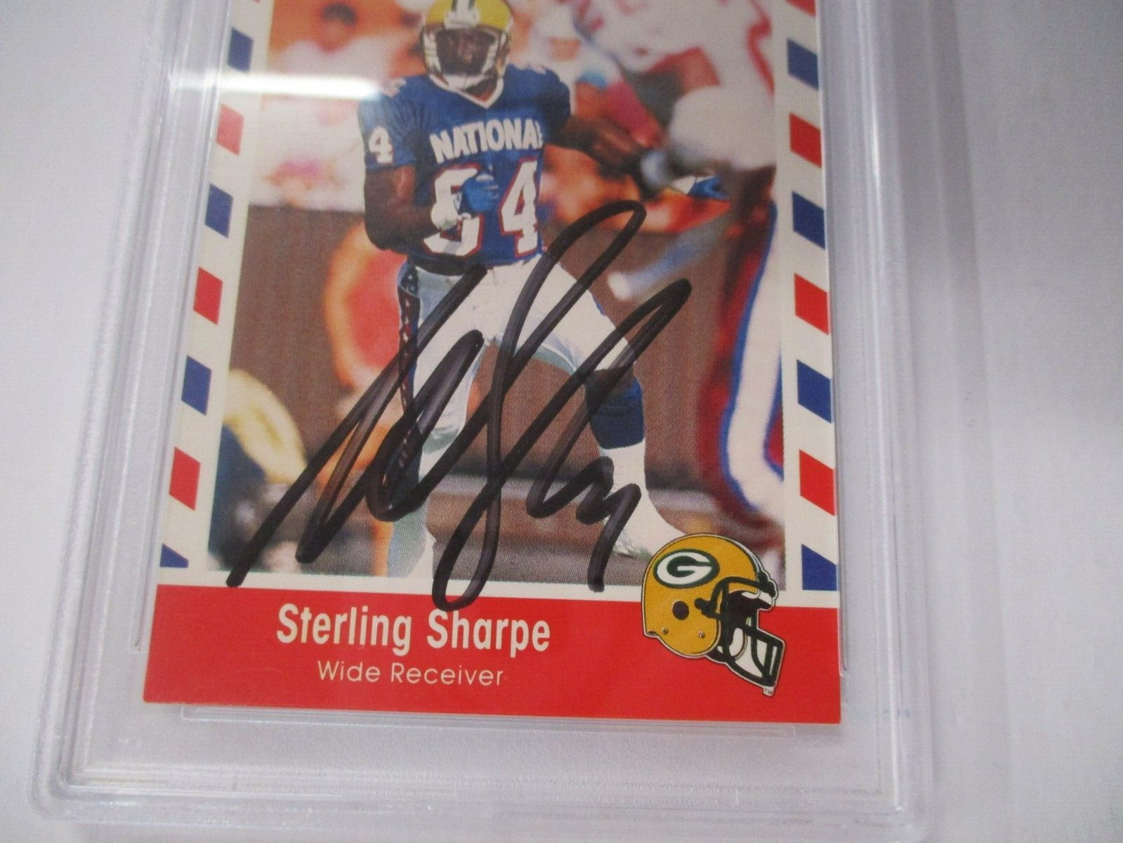 Sterling Sharpe NFL Autographed 1990 Stars N Stripes Topps Card #74 PSA Slab