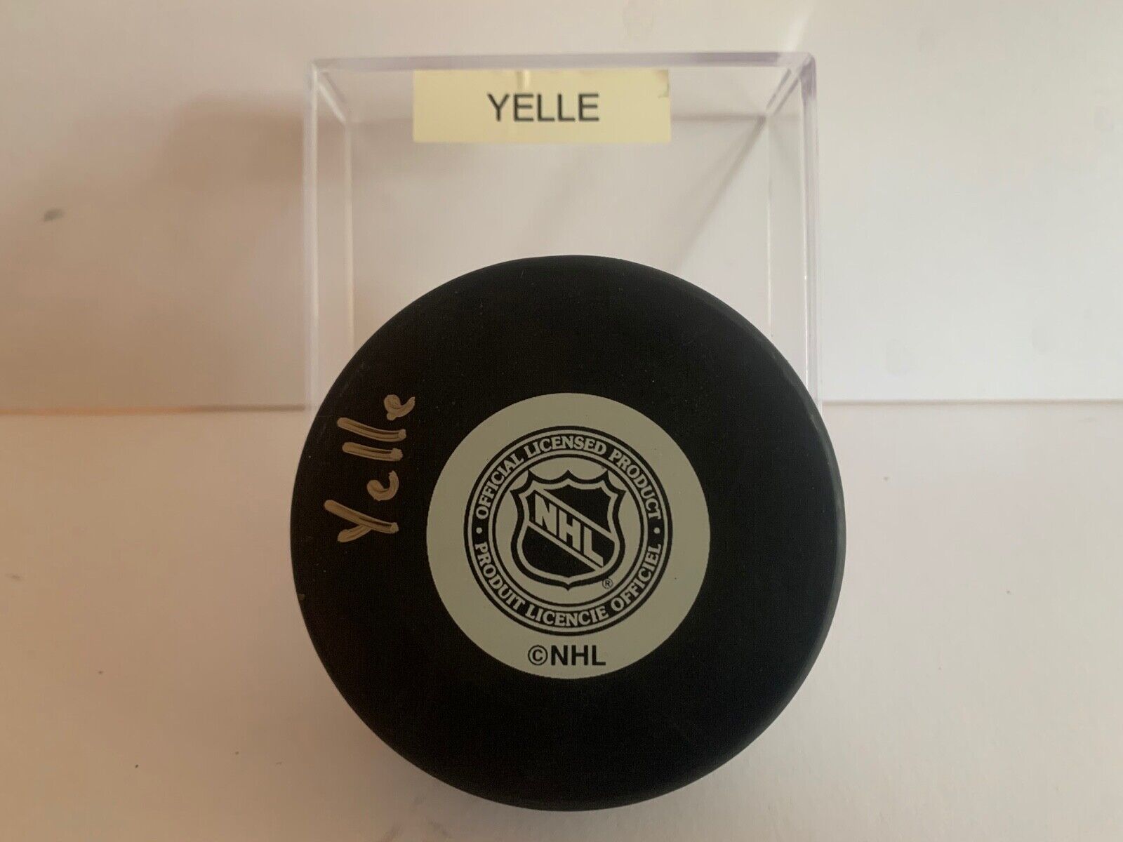 Stephane Yelle Autographed Official NHL Hockey Puck with Calgary Flames Logo