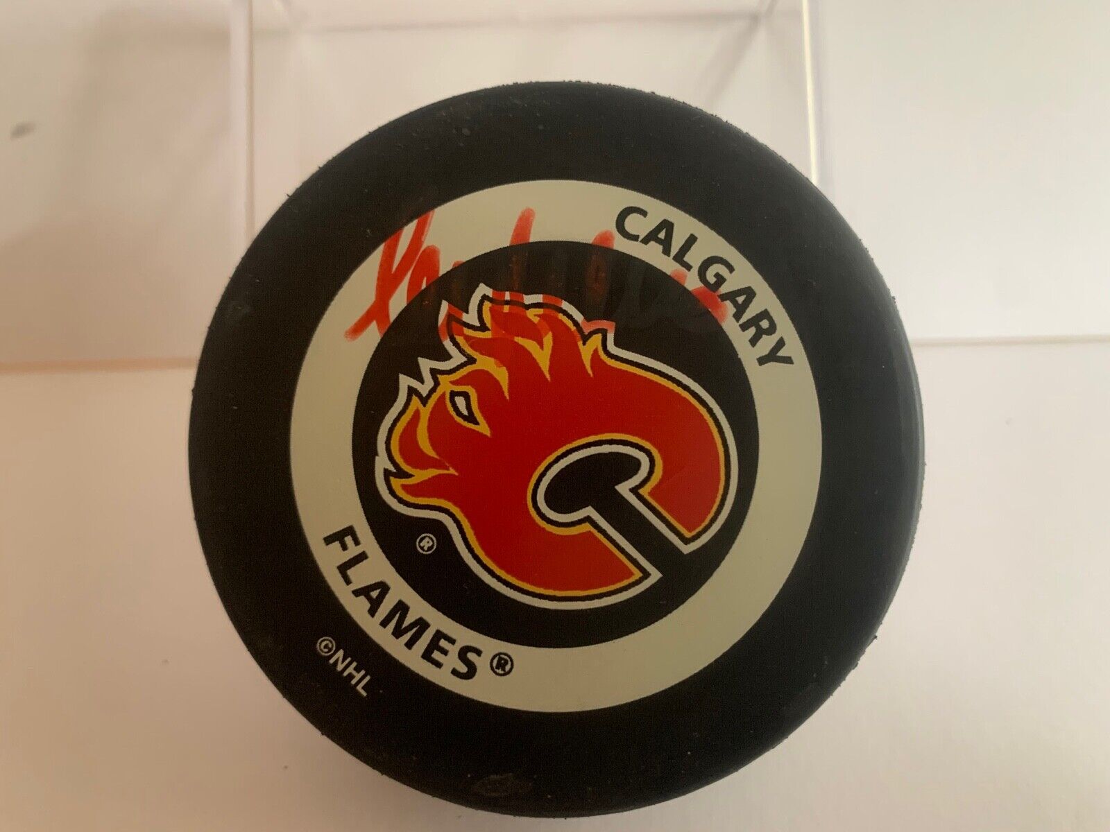 Mike Pelusso Autographed Official NHL Hockey Game Puck with Calgary Flames Logo