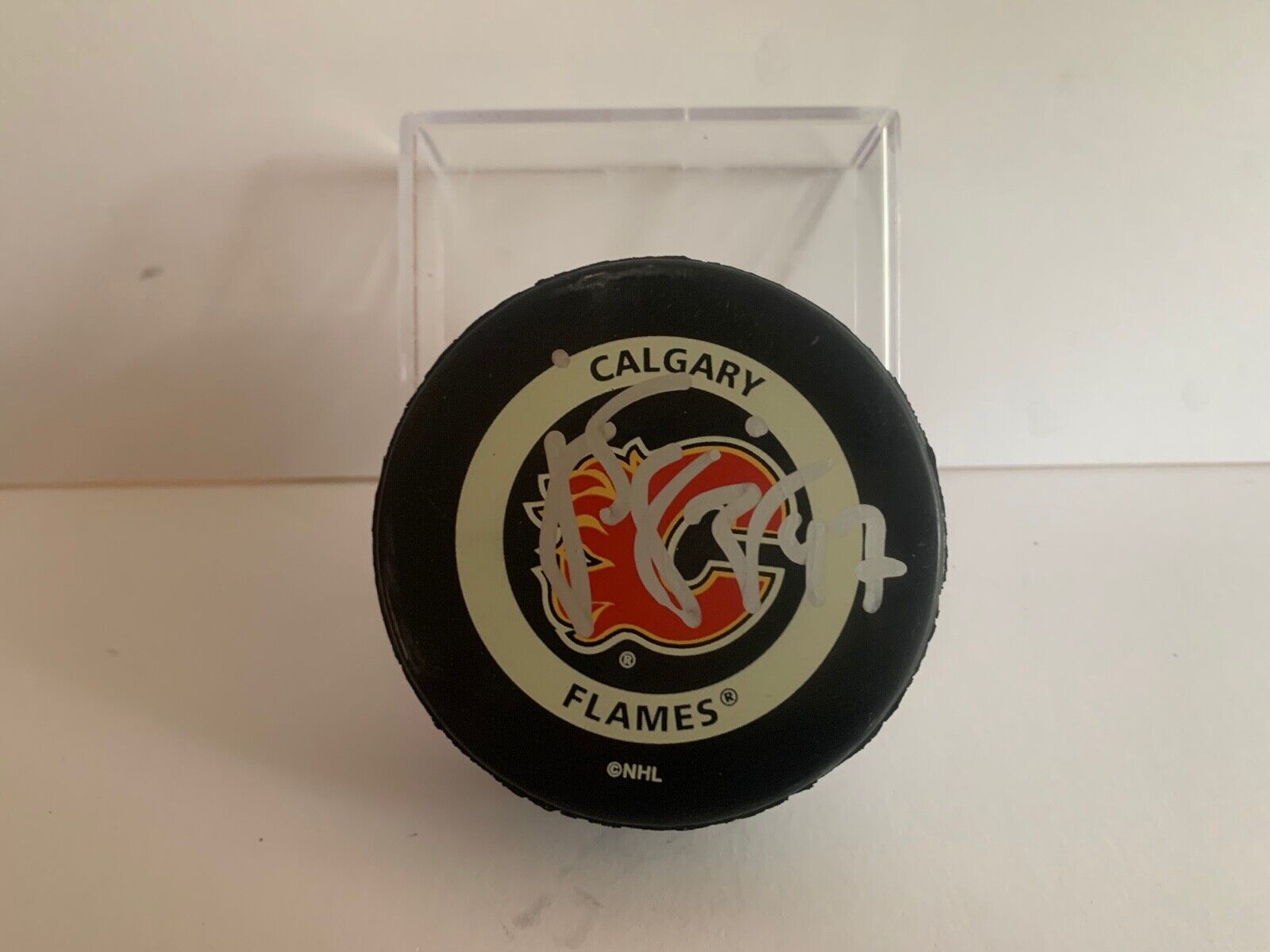 Rico Fata Autographed Official NHL Hockey Game Puck Calgary Flames Logo