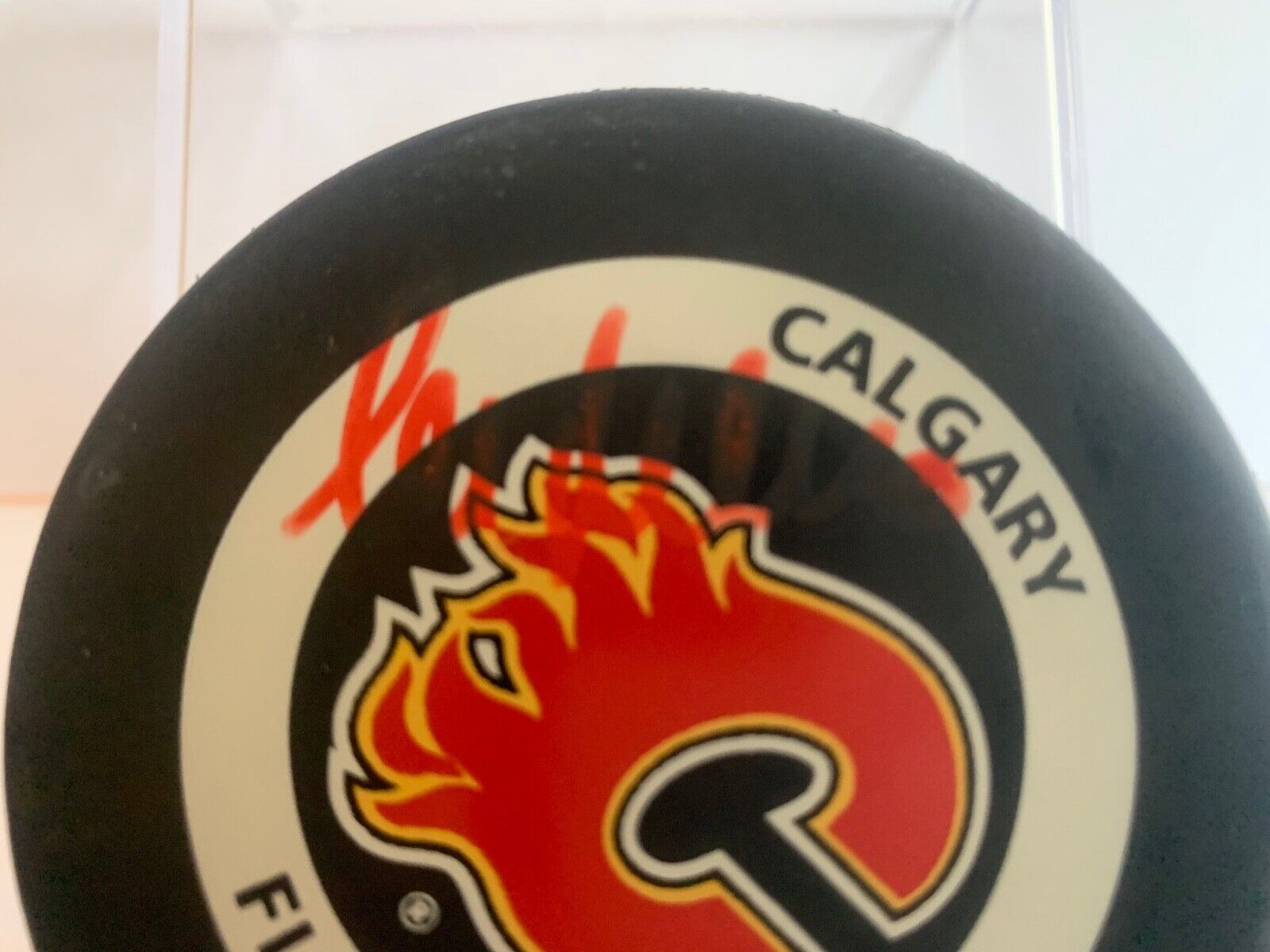 Mike Pelusso Autographed Official NHL Hockey Game Puck with Calgary Flames Logo