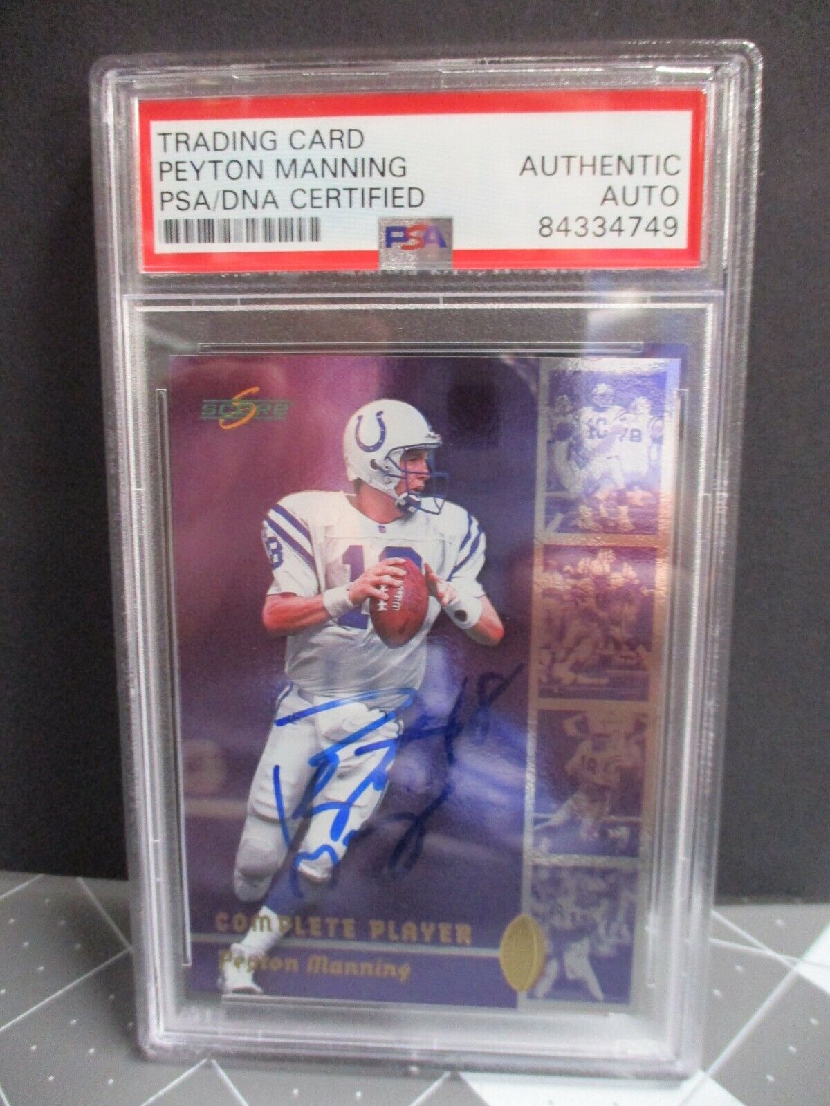 Peyton Manning Autographed 1999 Score Complete player Card PSA 84334749