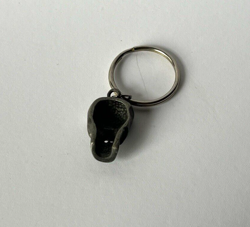 Skull Head With Ruby Eyes Keychain Approximately .5 x 1 Inch