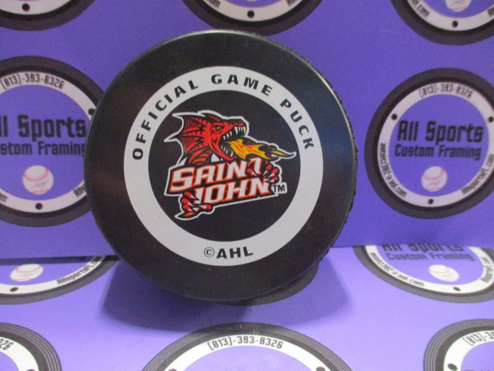 Saint Johns Flames Official Game Puck AHL Dragon American Hockey League