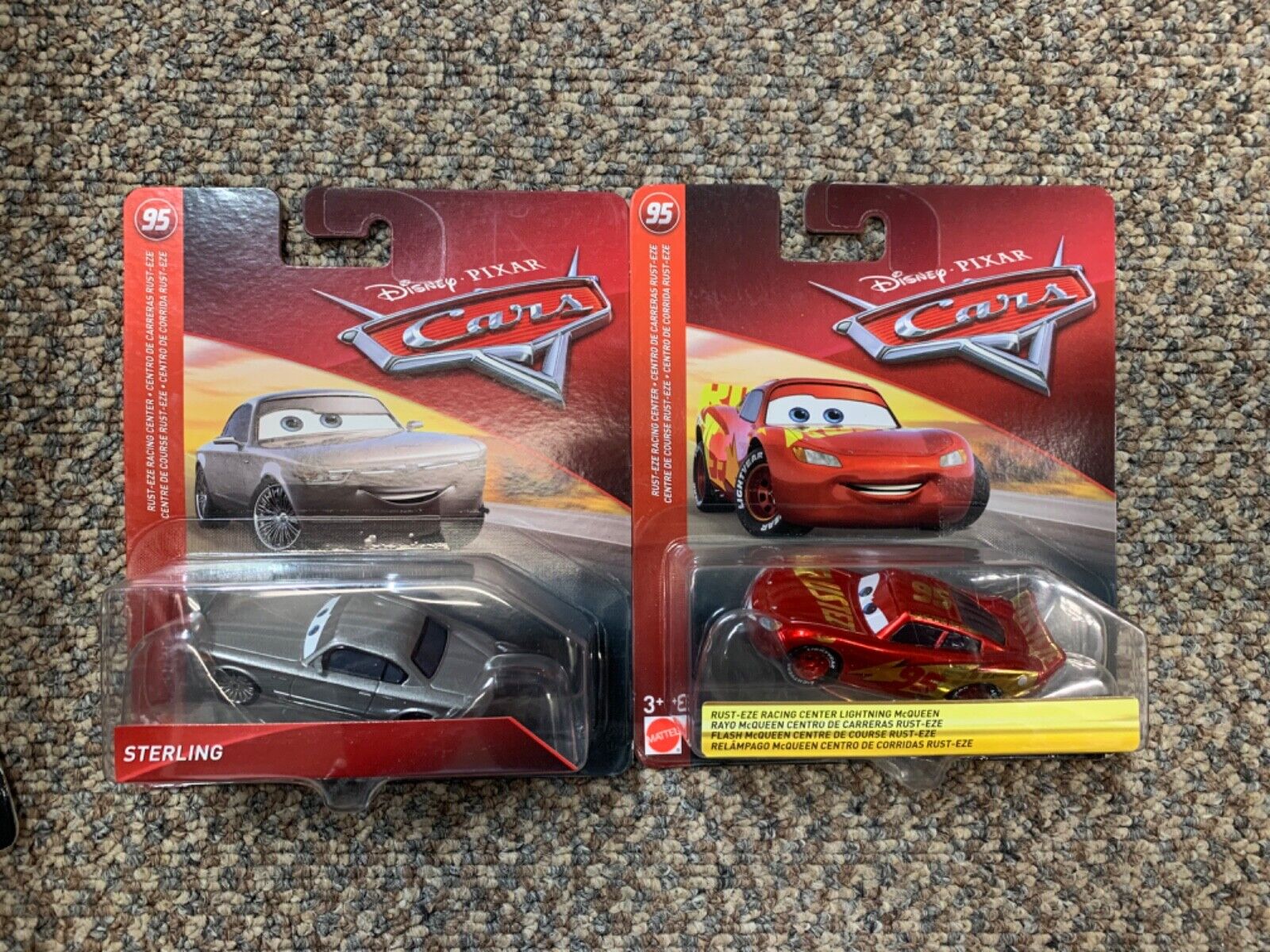 Disney Pixar Cars Sterling & Rust-Eze Racing Center Lightning McQueen lot of 2