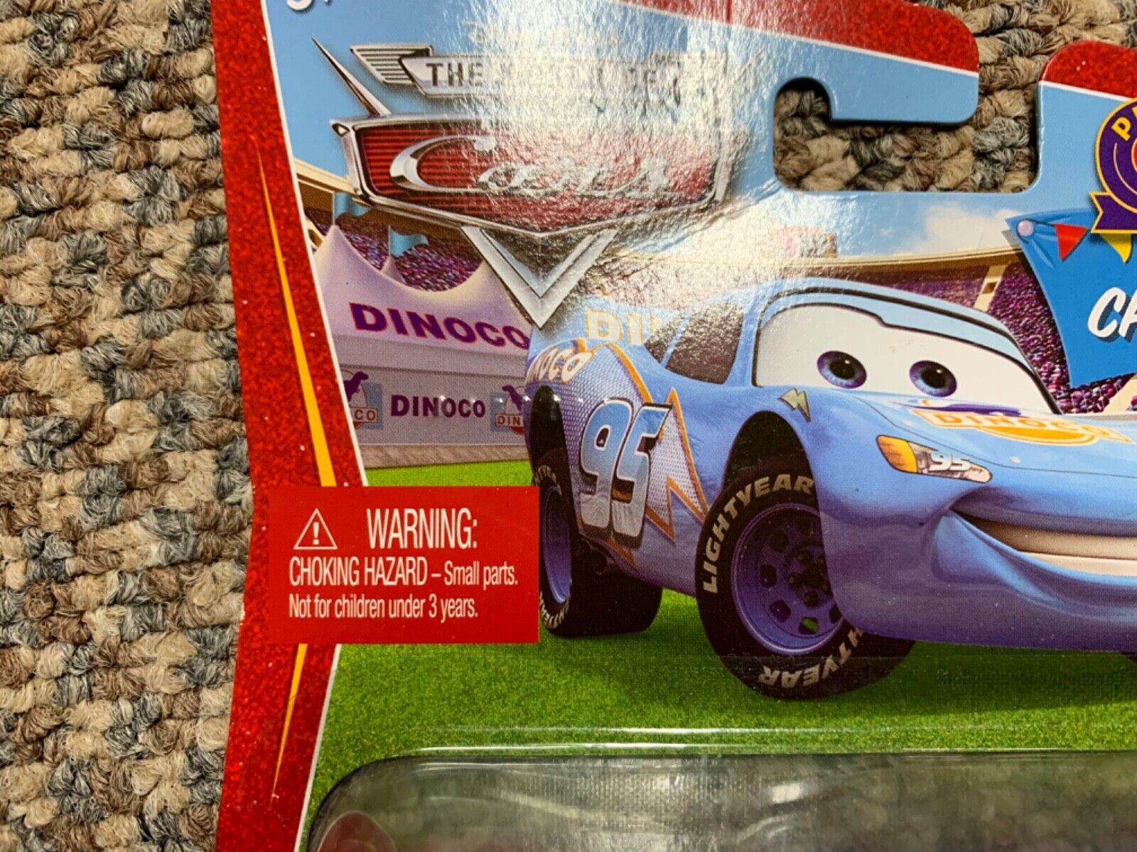 Disney Pixar Cars The World of Cars Dinoco Lightning McQueen w Piston Cup Chase