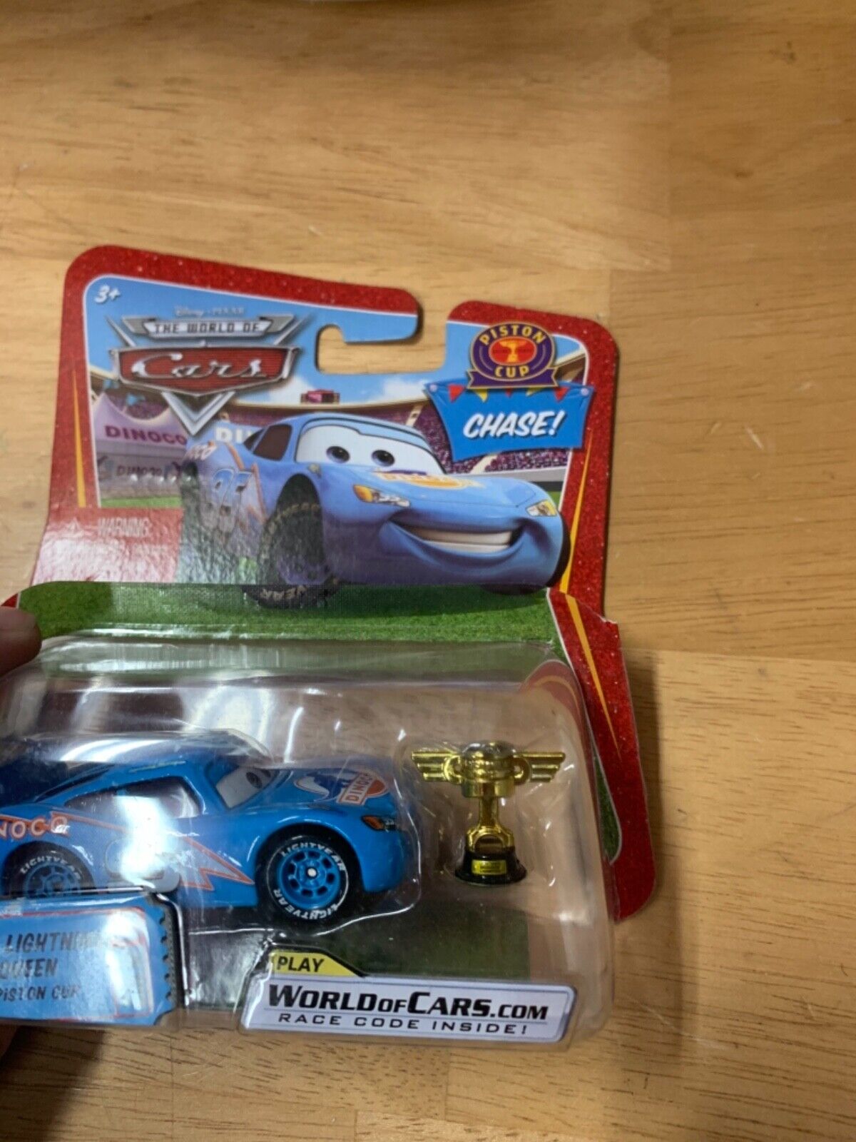 Disney Pixar Cars World of Cars Opened Dinoco Lightning McQueen Piston Cup CHASE