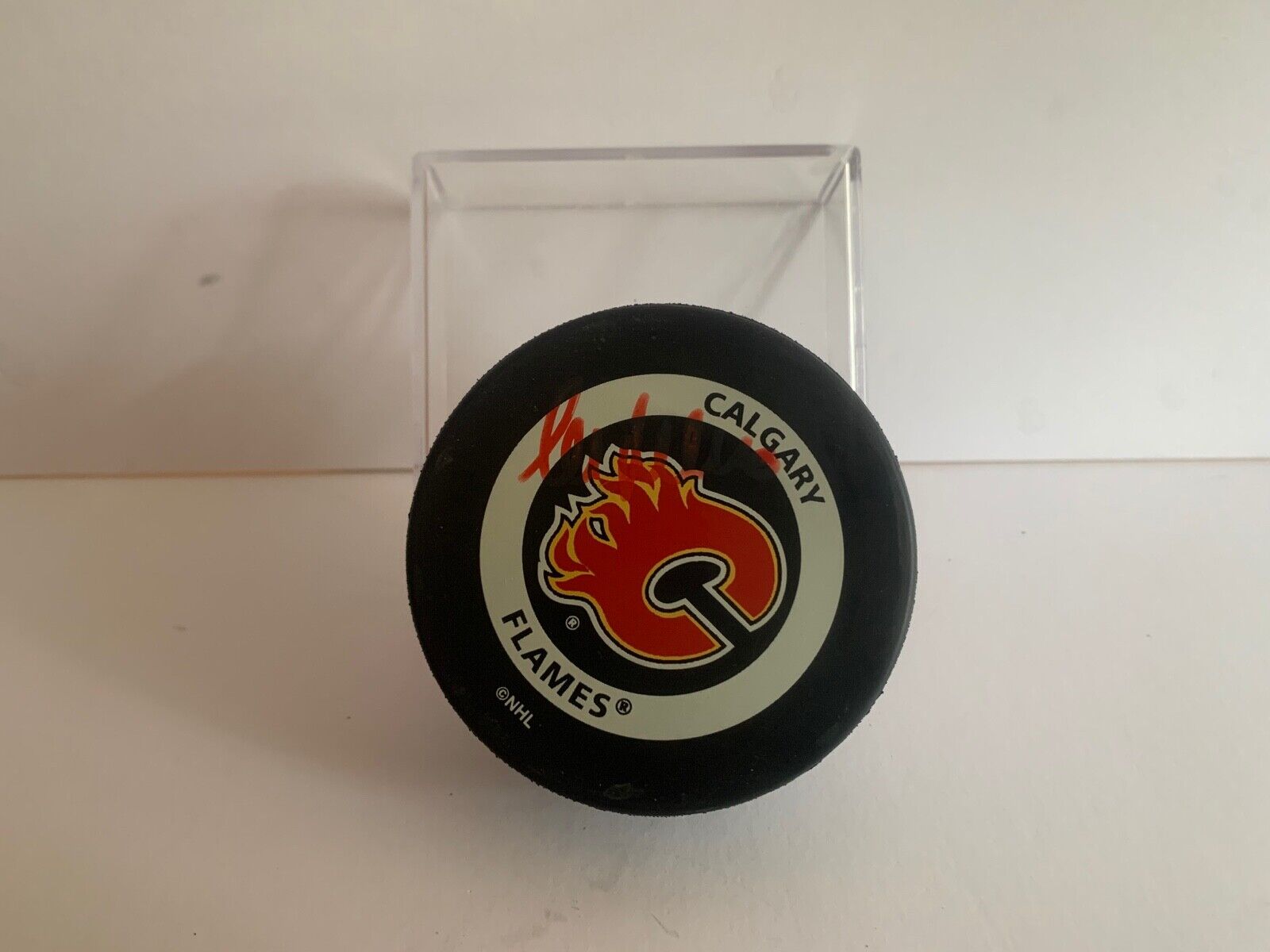Mike Pelusso Autographed Official NHL Hockey Game Puck with Calgary Flames Logo
