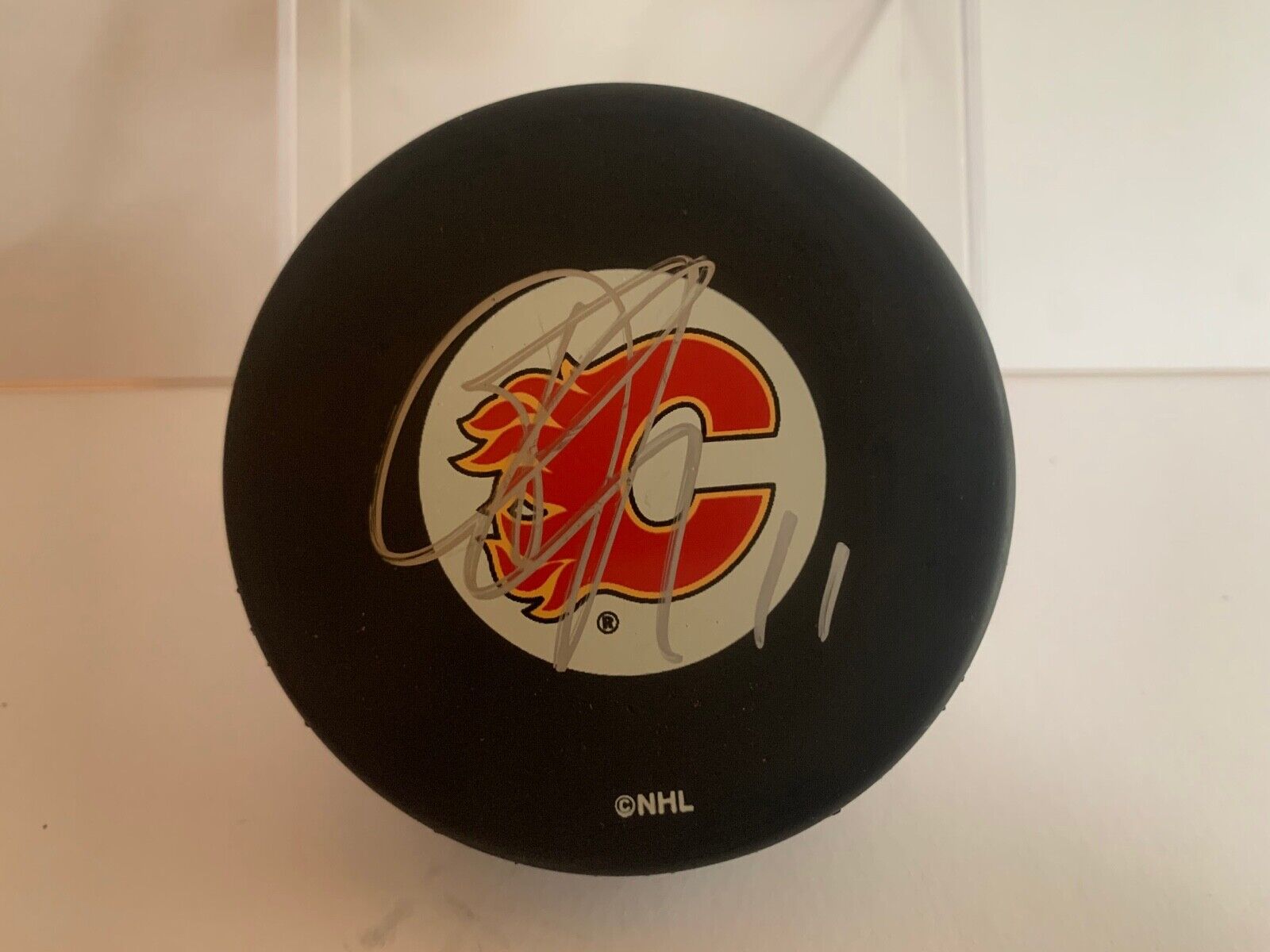 Stephane Yelle Autographed Official NHL Hockey Puck with Calgary Flames Logo